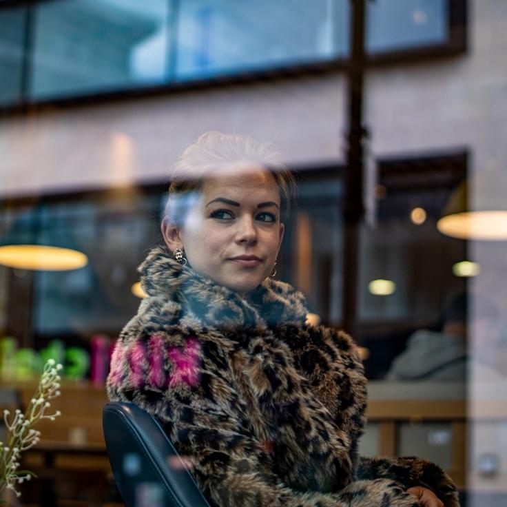 Portrait of Maya Chen, group coordinator and fusion cooking expert